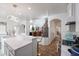 Open concept kitchen with a large island, perfect for entertaining, and offering seamless flow into the living spaces at 17641 W Corrine Dr, Surprise, AZ 85388