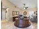 This comfortable office features travertine floors, a ceiling fan, and oversized desk at 17859 N Peppermill Ln, Surprise, AZ 85374