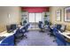 A community center computer room provides several desk spaces and computers for residents' use at 19973 N Monte Ln, Maricopa, AZ 85138