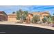 Single level home with low maintenance desert landscaping at 19973 N Monte Ln, Maricopa, AZ 85138