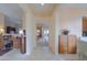 Warm and inviting foyer with tiled flooring at 19973 N Monte Ln, Maricopa, AZ 85138