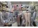 Walk-in closet provides ample storage and organization space for wardrobe at 19973 N Monte Ln, Maricopa, AZ 85138