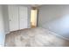 Bedroom with carpet flooring and a closet provides a comfortable and private space at 2009 E Lindrick Dr, Gilbert, AZ 85298