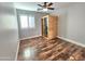 Bonus room showcasing light laminate wood floors, a ceiling fan, and a therapeutic sauna at 2009 E Lindrick Dr, Gilbert, AZ 85298