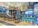Stylish bar area with ample seating, modern lighting, and sleek countertops at 20100 N 78Th Pl # 2210, Scottsdale, AZ 85255