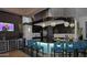 Modern bar with elegant lighting, wine coolers, and chic bar stools at 20100 N 78Th Pl # 2210, Scottsdale, AZ 85255
