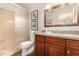 Bathroom featuring a stylish vanity with a mirror and a glass-enclosed shower at 20100 N 78Th Pl # 2210, Scottsdale, AZ 85255