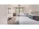 Bright bedroom featuring two beds, ceiling fan, and stylish decor at 20100 N 78Th Pl # 2210, Scottsdale, AZ 85255