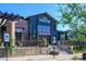 A two-story commercial building that houses the Cedar Room Fine Cigars & Lounge and a barbershop with open sign at 20100 N 78Th Pl # 2210, Scottsdale, AZ 85255