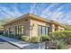 Exterior view of the fitness center, featuring large windows and landscaping, inviting residents to an active lifestyle at 20100 N 78Th Pl # 2210, Scottsdale, AZ 85255