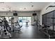 Bright fitness center featuring various exercise machines and large windows overlooking the pool at 20100 N 78Th Pl # 2210, Scottsdale, AZ 85255