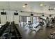 Spacious gym equipped with weights, machines, and televisions for a complete fitness experience at 20100 N 78Th Pl # 2210, Scottsdale, AZ 85255