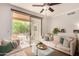 Comfortable living room with stylish furnishings and a sliding glass door to a private balcony at 20100 N 78Th Pl # 2210, Scottsdale, AZ 85255