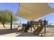 Inviting community playground with slides and a shaded play area with swings and climbing for recreation at 20100 N 78Th Pl # 2210, Scottsdale, AZ 85255