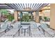 Comfortable lounge chairs surround a poolside cabana with plants adding natural beauty in this serene outdoor space at 20100 N 78Th Pl # 2210, Scottsdale, AZ 85255