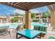 Inviting pool with lounge area, stone waterfall features, and beautiful architecture at 20100 N 78Th Pl # 2210, Scottsdale, AZ 85255