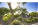 Entrance signage for The Edge at Grayhawk, beautifully landscaped with desert plants, cacti and flowering bushes at 20100 N 78Th Pl # 2210, Scottsdale, AZ 85255