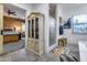 Bathroom with walk-in shower, tiled floor, and open access to the main bedroom at 20125 E Via Del Rancho --, Queen Creek, AZ 85142
