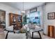 Bright dining area with a glass table, comfortable chairs and lots of natural light at 20125 E Via Del Rancho --, Queen Creek, AZ 85142