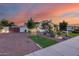 Attractive home with a desert-landscaped front yard, gravel accents, and a welcoming walkway at 20125 E Via Del Rancho --, Queen Creek, AZ 85142