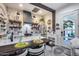 Modern kitchen with granite countertops, island, open shelves and stainless appliances at 20125 E Via Del Rancho --, Queen Creek, AZ 85142