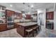 Well-equipped kitchen with stainless steel appliances, a large island, and modern lighting fixtures at 20125 E Via Del Rancho --, Queen Creek, AZ 85142