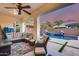 Relaxing covered patio with plush seating and views of the sparkling pool and landscaped backyard at 20125 E Via Del Rancho --, Queen Creek, AZ 85142
