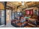 Home theater boasts leather recliners, wood accents, and a built-in bookcase at 20125 E Via Del Rancho --, Queen Creek, AZ 85142
