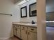 Bathroom featuring framed mirrors and granite counters at 2035 S Elm St # 114, Tempe, AZ 85282