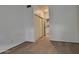 Bright bedroom with light wood floors and closet at 2035 S Elm St # 114, Tempe, AZ 85282