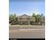 Inviting two-story home featuring a well-maintained lawn, mature trees, and a classic design at 2035 S Elm St # 114, Tempe, AZ 85282