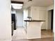 Open kitchen view with breakfast bar and appliances at 2035 S Elm St # 114, Tempe, AZ 85282