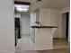 Updated kitchen with stainless appliances, breakfast bar with wooden top and neutral decor at 2035 S Elm St # 114, Tempe, AZ 85282
