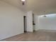 A brightly lit living room area features hard surface floors and neutral walls at 2035 S Elm St # 114, Tempe, AZ 85282