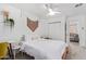 Inviting bedroom featuring a ceiling fan, closet, and comfortable furnishings at 2320 E Harvard St, Phoenix, AZ 85006