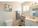 Cozy bathroom featuring a neutral wall, white vanity, and cabinet at 2359 W Del Oro Cir, Mesa, AZ 85202