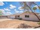 Attractive one-story home with a spacious driveway and minimal landscaping at 2359 W Del Oro Cir, Mesa, AZ 85202