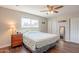 Spacious main bedroom featuring hardwood floors and a ceiling fan at 2359 W Del Oro Cir, Mesa, AZ 85202
