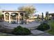 Inviting pool and spa with covered patio, desert landscaping and mountain views at 23779 N 91St St, Scottsdale, AZ 85255