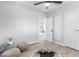 Bedroom featuring a ceiling fan and plush floor decor at 2418 W Flower St, Phoenix, AZ 85015