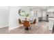 Cozy dining area featuring a stylish table setting and modern decor, ideal for intimate meals at 2418 W Flower St, Phoenix, AZ 85015
