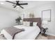 Relaxing main bedroom with a ceiling fan and neutral decor at 2418 W Flower St, Phoenix, AZ 85015