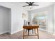 Bright office space with natural light and sliding glass door access to the backyard at 2418 W Flower St, Phoenix, AZ 85015