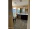 Bright bathroom with dual sink vanity, tiled floors, and a glass-enclosed shower at 25532 W Williams W St, Buckeye, AZ 85326