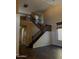 Spacious living room featuring high ceilings, hardwood floors, and a staircase leading to the second floor at 25532 W Williams W St, Buckeye, AZ 85326