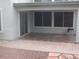 Covered patio with a brick surround and lots of space for outdoor seating at 25532 W Williams W St, Buckeye, AZ 85326
