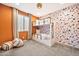 ' bedroom with a bunk bed, bean bag chairs, and a unique accent wall at 25945 W Sands Dr, Buckeye, AZ 85396