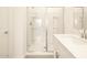 Modern bathroom showcasing a glass shower enclosure and white tile at 2673 E San Miguel Dr, Casa Grande, AZ 85194