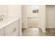 Stylish bathroom with tiled flooring and a view into the next room at 2673 E San Miguel Dr, Casa Grande, AZ 85194