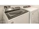 Convenient laundry area featuring a modern Whirlpool washer and dryer set for efficient home maintenance at 2673 E San Miguel Dr, Casa Grande, AZ 85194